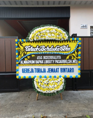 Papan Bunga Duka di Wawo